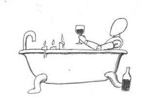 A wooden mannequin supping wine in a bath.